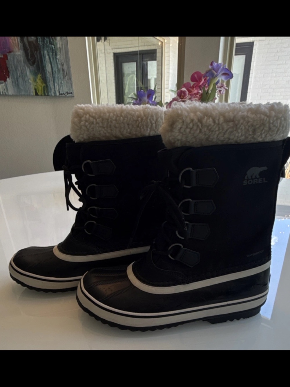 Sorel women’s Black Winter Boots with Cream Sherpa Cuff